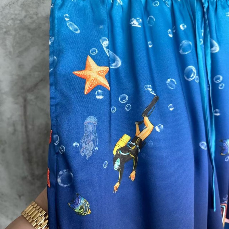 CASABLANCA Blue silk shorts with marine animal print