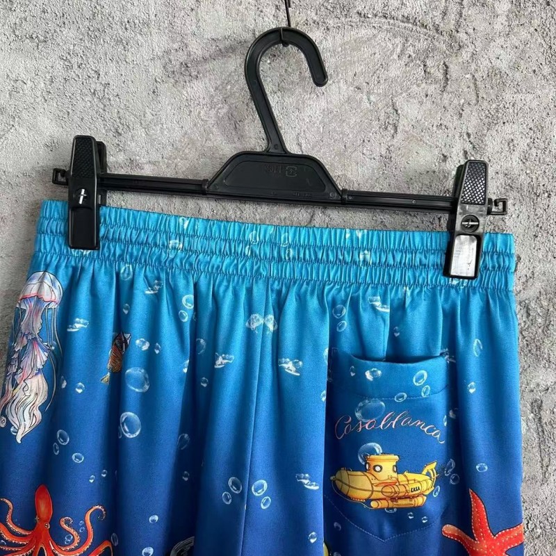 CASABLANCA Blue silk shorts with marine animal print