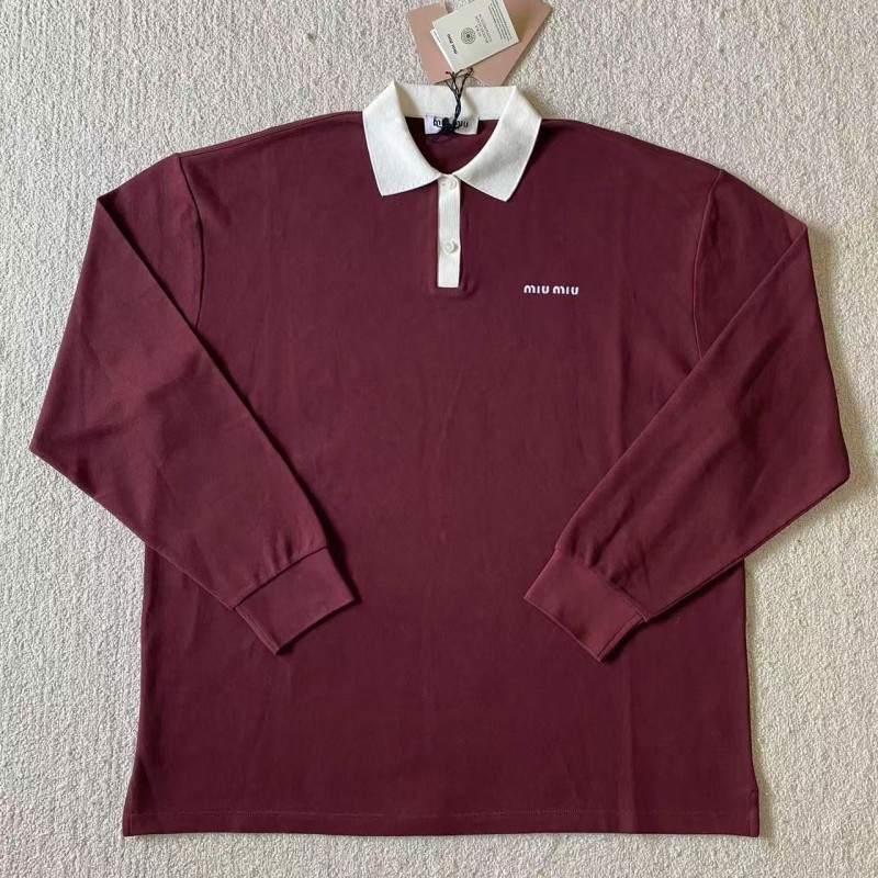 M*um*u red polo shirt