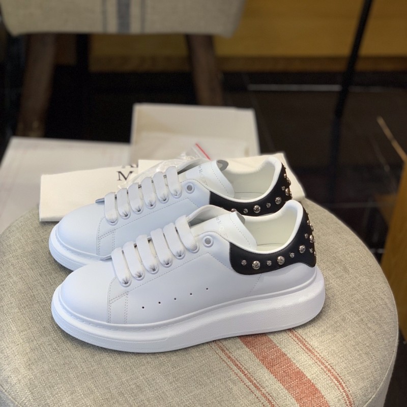 Ale*d*r M*Q*en MQ Cross nail tail Sneakers