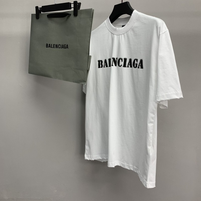 Ba*len*cia*ga front and back T-shirt with blurred letters