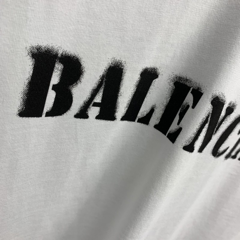 Ba*len*cia*ga front and back T-shirt with blurred letters