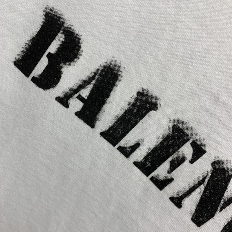 Ba*len*cia*ga front and back T-shirt with blurred letters
