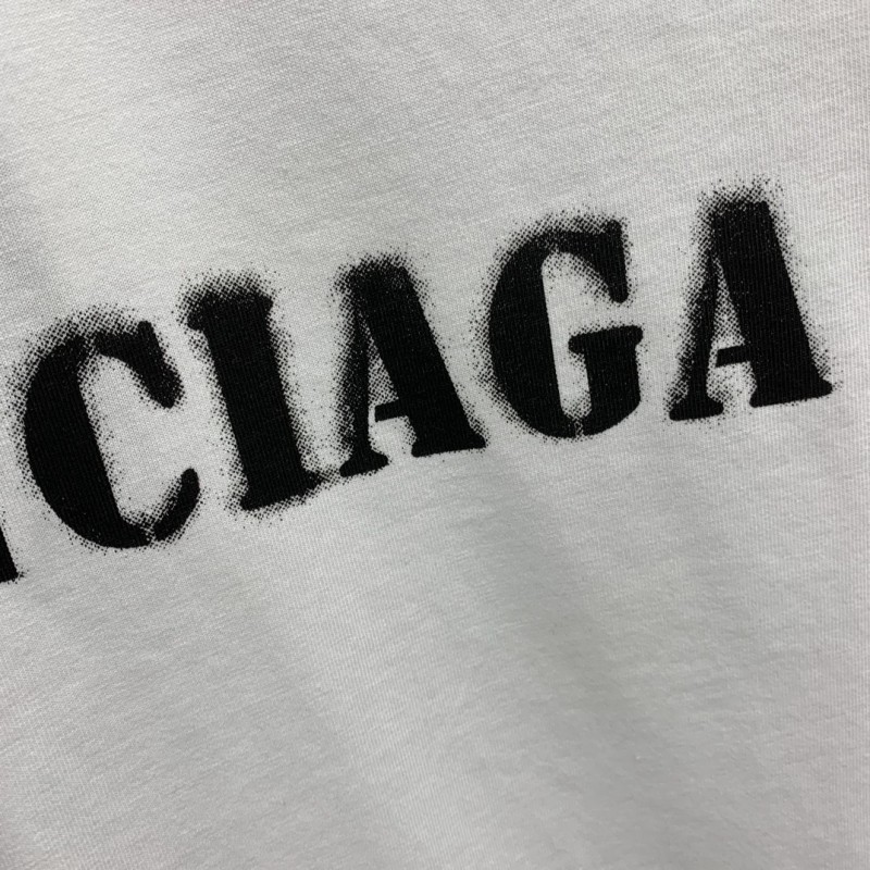 Ba*len*cia*ga front and back T-shirt with blurred letters