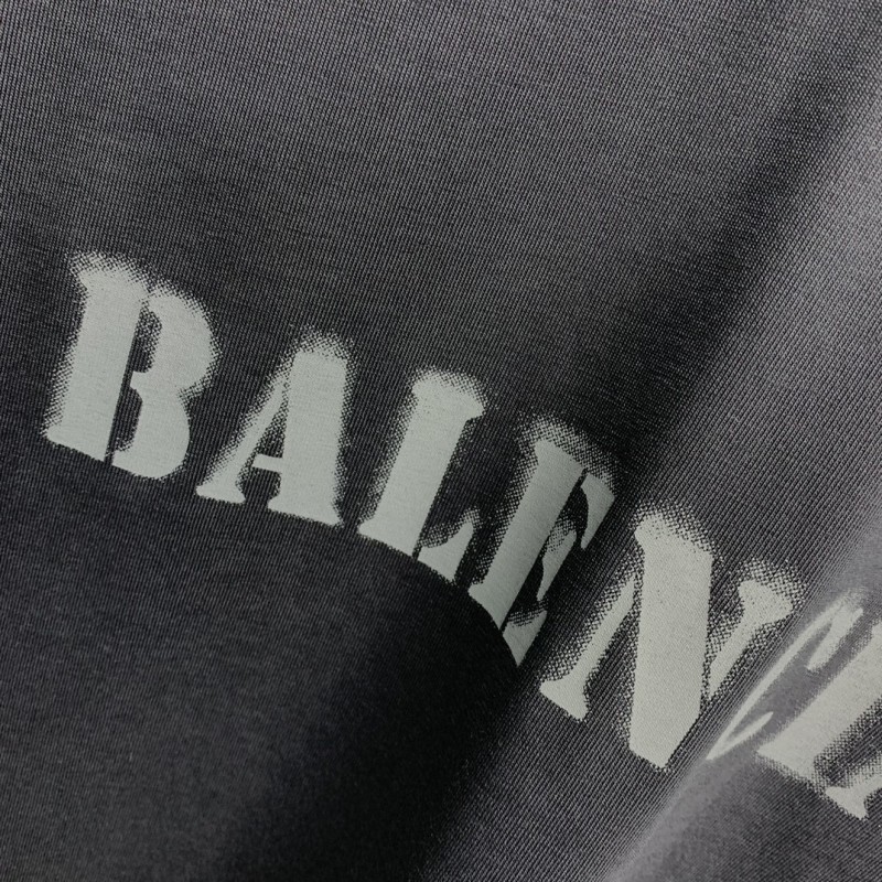 Ba*len*cia*ga front and back T-shirt with blurred letters