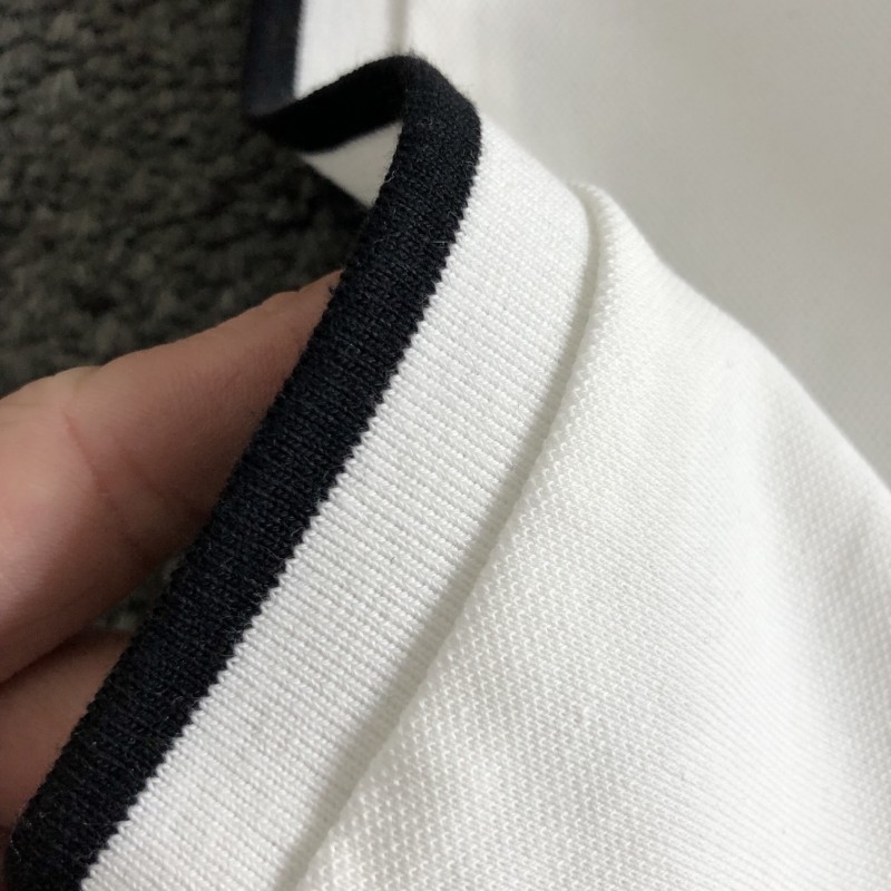 Givenchy Monochrome embroidered polo shirt with lapel